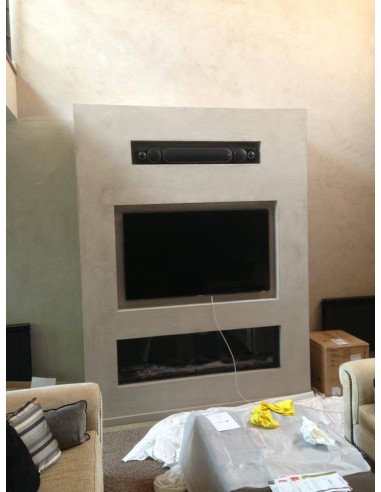 Cine en casa Denon con Monitor Audio y TV Samsung