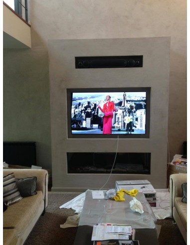 Cine en casa Denon con Monitor Audio y TV Samsung