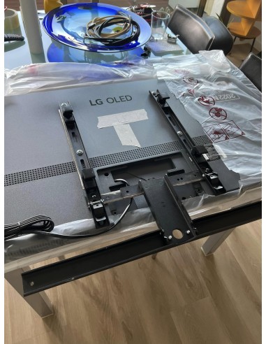 Colgar televisión (soporte motorizado)