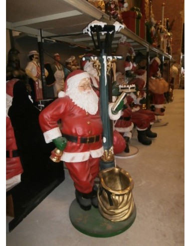 Papa Nöel con farola y saco regalos dorado