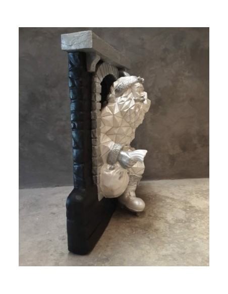 Papa Nöel saliendo chimenea