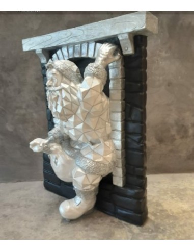 Papa Nöel saliendo chimenea